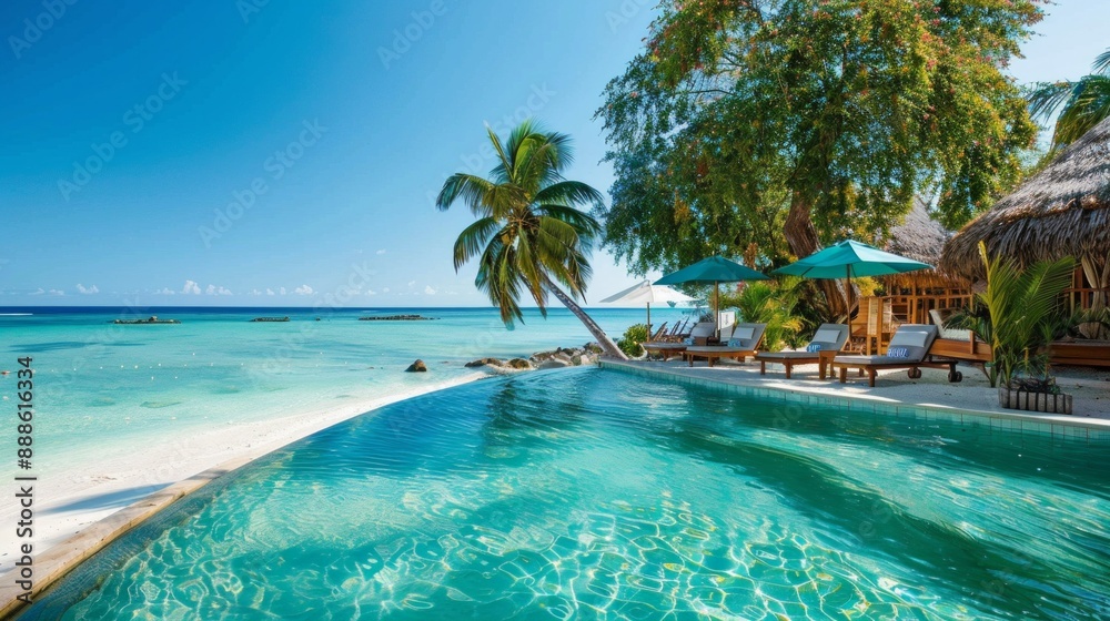 Fototapeta premium A beautiful beach with a pool and palm trees