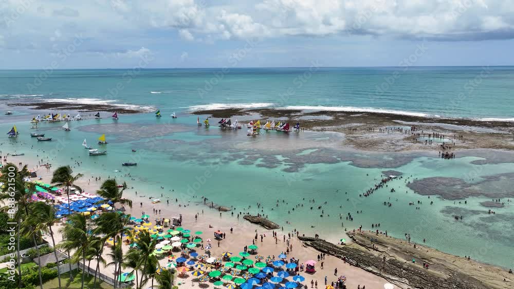 Natural Pools At Port Of Chickens Pernambuco Brazil. Turquoise Ocean Waves Gently Crashing On Tropical Beach. Shore Clouds Sky Beach Sea. Shore Seaside Travel. Port of Chickens Pernambuco. Natural Pools At Port Of Chickens Pernambuco Brazil. Turquoise Ocean Waves Gently Crashing On Tropical Beach. Shore Clouds Sky Beach Sea. Shore Seaside Travel. Port of Chickens Pernambuco.