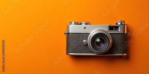 of retro camera with orange backdrop, vintage, old-fashioned, photography, equipment, technology, classic, design