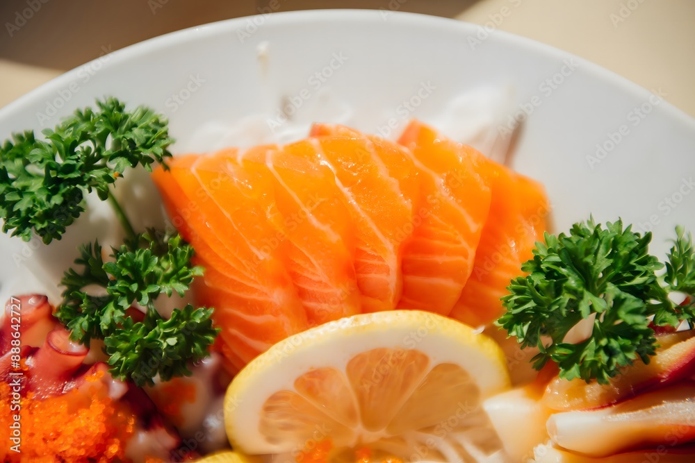 Sashimi mori, mix sashimi set served in ceramic plate decorated with green lettuce. Japanese Cuisine Buffet. Chef's Choice: Salmon, hamachi, Ika, Tako, Hotate and hokkigai Sashimi mori, mix sashimi set served in ceramic plate decorated with green lettuce. Japanese Cuisine Buffet. Chef's Choice: Salmon, hamachi, Ika, Tako, Hotate and hokkigai