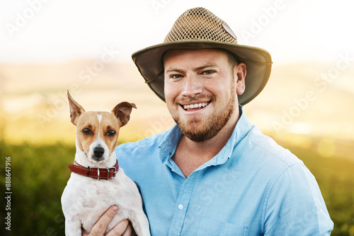 Happy, farm and portrait of man with dog for pet training in agro, sustainable or nature environment. Field, smile and male agriculture worker bonding with jack russell puppy in Texas countryside. photo