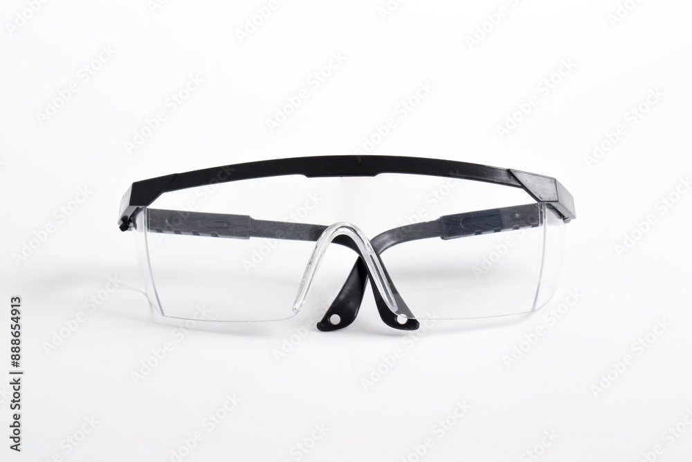 Clear plastic safety goggles isolated on white background Clear plastic safety goggles isolated on white background