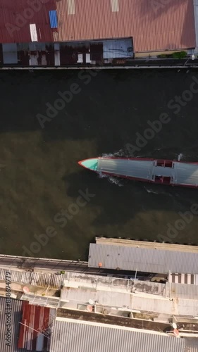 An aerial view of Long-tail boats with water traffic in Saen Sab Canal in Bangkok, Thailand. photo