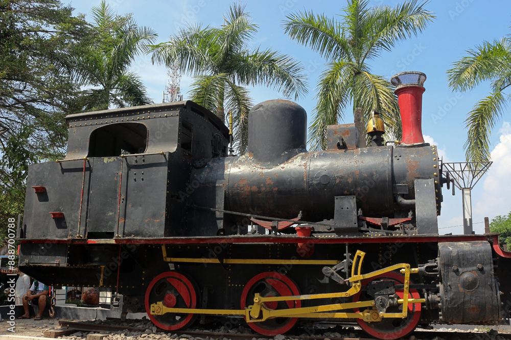 Naklejka premium Side view of a steam locomotive used as transportation in wood exploitation activities from the Cepu forest area in 1915 - 2010
