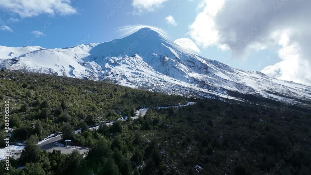Osorno Volcano At Puerto Varas Los Lagos Chile. Snow-Capped Volcano Releasing Plumes Of Smoke Into Blue Sky. Outdoor Travel Patagonia Glacier. Snow Covered Aerial Landscape. Puerto Varas Los Lagos. Osorno Volcano At Puerto Varas Los Lagos Chile. Snow-Capped Volcano Releasing Plumes Of Smoke Into Blue Sky. Outdoor Travel Patagonia Glacier. Snow Covered Aerial Landscape. Puerto Varas Los Lagos.