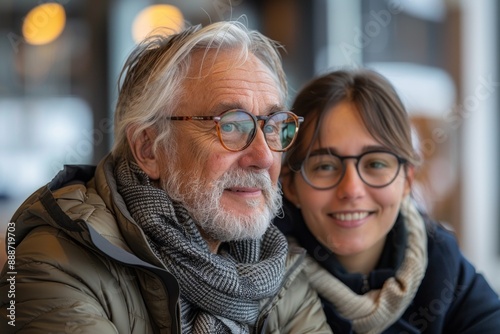 Happy Young Adults and Senior Mentors Collaborating in Technology and Coding Projects