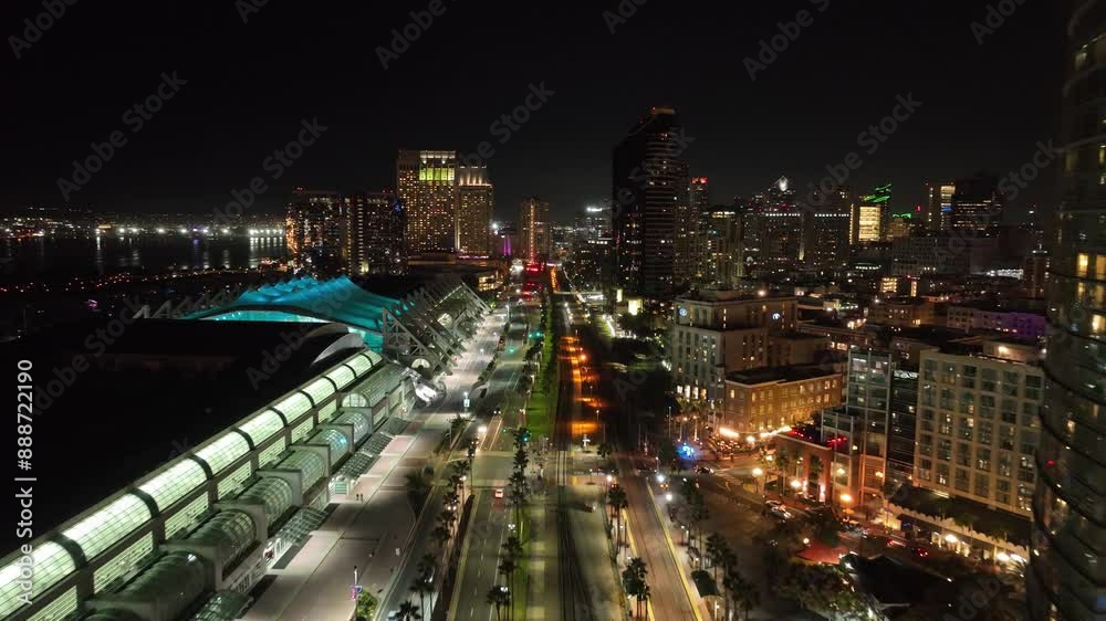 Night Convention Center At San Diego California United States. Aerial View Of A High-Rise Buildings And Traffic Showcasing Urban Life. Building Town Sky Illuminated Urban. Night Convention Center At San Diego California United States. Aerial View Of A High-Rise Buildings And Traffic Showcasing Urban Life. Building Town Sky Illuminated Urban.