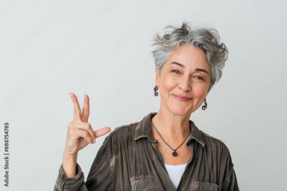 Portrait of a woman celebrating on a white background Portrait of a woman celebrating on a white background
