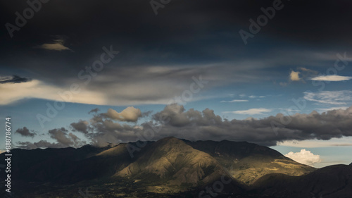 Colombian Mountain scenary in Cundinamarca cloudy blue sky with sunbeams