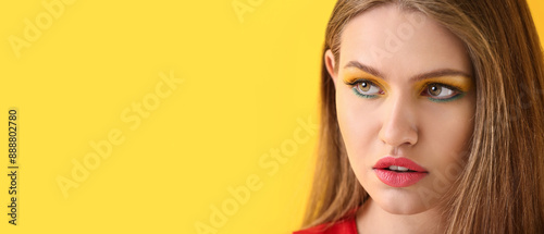 Beautiful young woman with ...