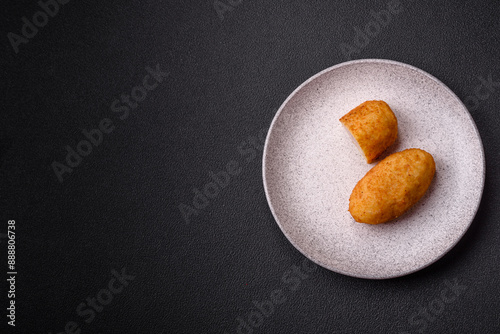 Delicious chicken Kiev or potato cutlets with salt, spices and herbs