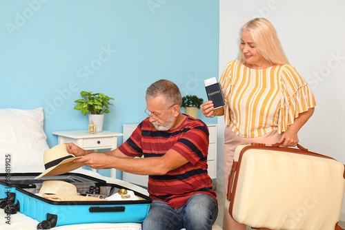 Senior couple with passport...