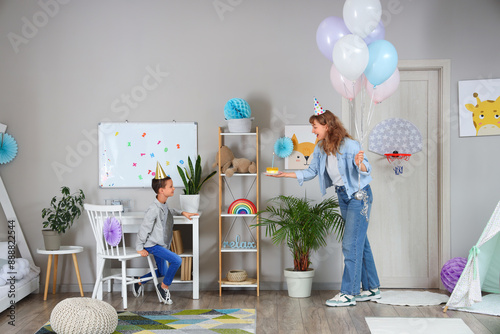 Mother with balloons and Bi...