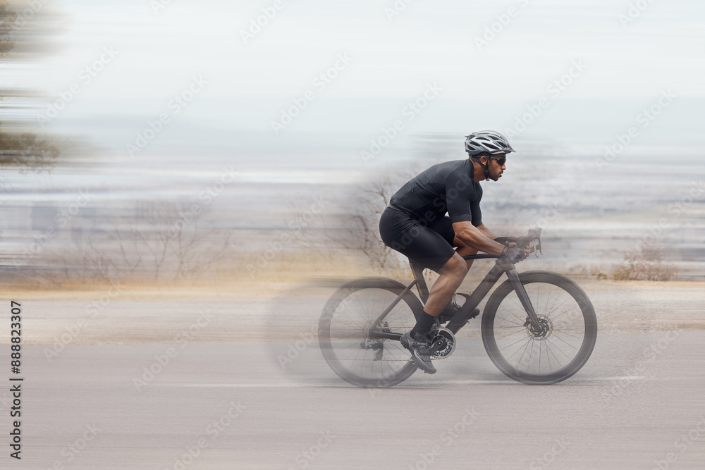 Fototapeta premium Man, fitness and speed with cyclist on mountain bike in workout, exercise or outdoor cardio. Active male person, athlete with motion blur on bicycle for fast cycling or extreme adrenaline on road