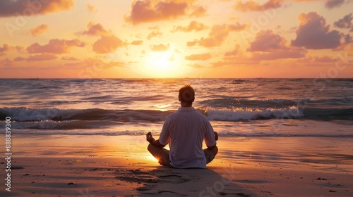 A man practicing deep breathing exercises on a quiet beach at sunrise, with gentle waves in the background