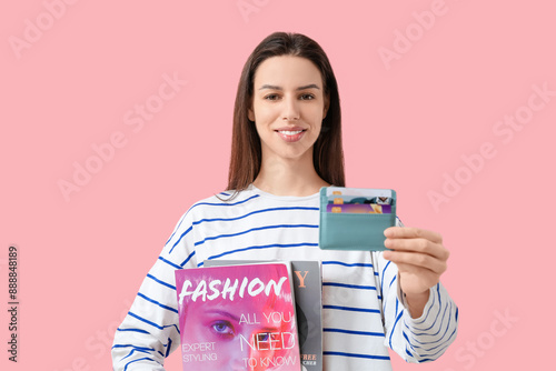 Woman with credit card hold...