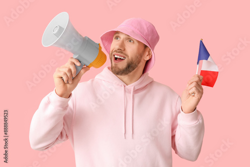 Young man with flag of Fran...
