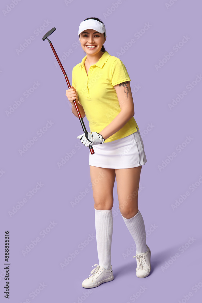Beautiful female golfer on lilac background Beautiful female golfer on lilac background