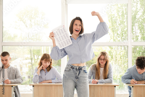 Smiling female student with...