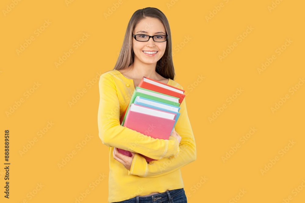 Excited student woman holding books Excited student woman holding books