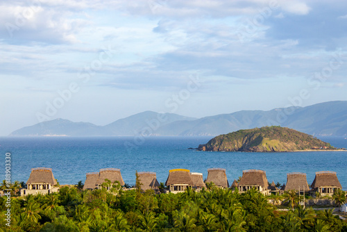 Panoramic View Of Beautiful Beach With Mountain, Island And Tourist Resorts At Coastal In Nha Trang City, Vietnam.