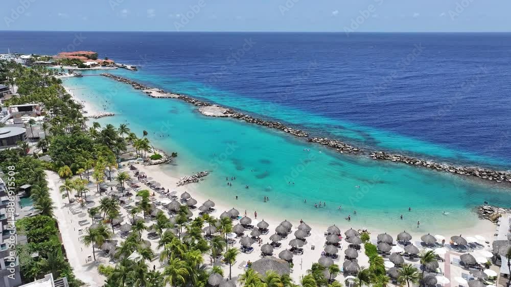 Beach Resort At Willemstad Netherlands Curacao. Tourists Enjoying A Sunny Day At A Caribbean Sea. Coast Horizon Seaside Summertime. Remote Location Seaside Scenic Coastline. Willemstad Netherlands.