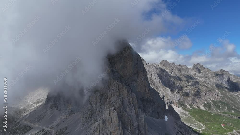 Clouds blocking view of peak Picos de Europa Spain high in mountains drone, aerial Clouds blocking view of peak Picos de Europa Spain high in mountains drone, aerial