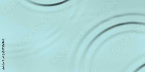 Green liquid top view. Water surface with gentle ripples and concentric rings, the water surface is clear green with waves. Colorful liquid top view. Spa concept background. Flat lay, copy space.