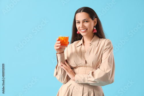 Young woman with aperol spr...