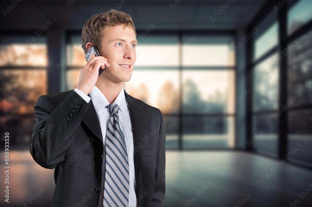 Happy young business woman holding smartphone Happy young business woman holding smartphone