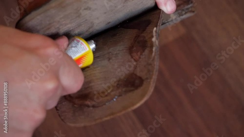 Cleaning and repairing old men's shoes using glue