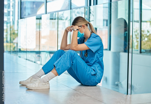 Healthcare, doctor and woman on floor with stress for burnout, mistake or surgery fail in hospital. Tired, health and sad female physician with face mask in clinic for fatigue, medical crisis or loss