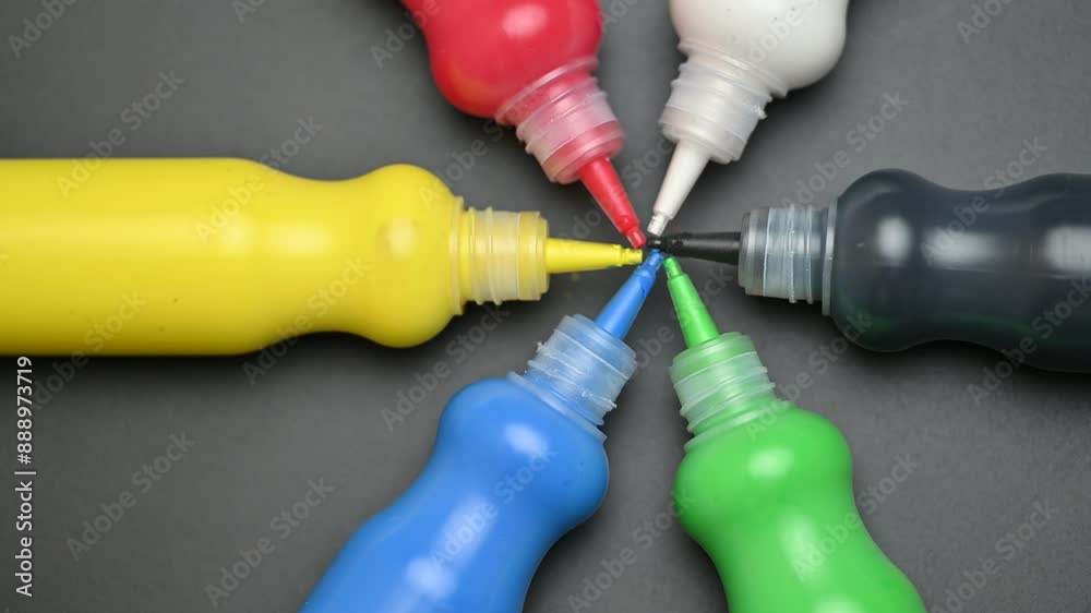 bottles with colored paint for painting