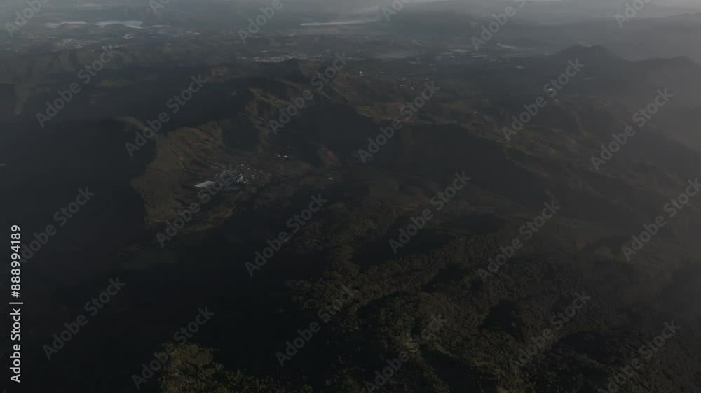 Aerial view of erupting volcano with sunrise over crater, Fuego, Chimaltenango, Guatemala. Aerial view of erupting volcano with sunrise over crater, Fuego, Chimaltenango, Guatemala.