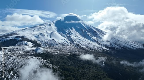 Osorno Volcano At Osorno Los Lagos Chile. Volcano Showcasing The Raw Power And Beauty Of Nature. Outdoor Travel Patagonia Glacier. Snow Covered Aerial. Osorno Los Lagos. photo