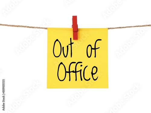 A yellow sticky note with the handwritten text Out of office in black letters. Is it correct: out-of-office message on a paper note