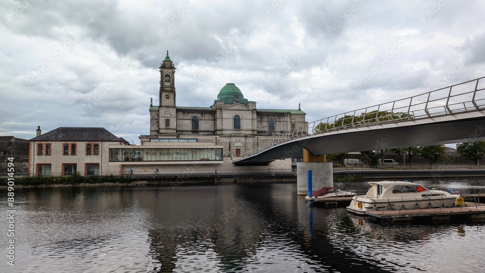 Beautiful old cityscape scenery, Church of Saints Peter & Paul by Shannon river at Athlone, town in Westmeath, Ireland, landmark and architecture background