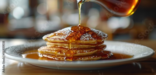 Freshly Made Stack of Buttery Pancakes Drizzled With Syrup and Topped With Pe...