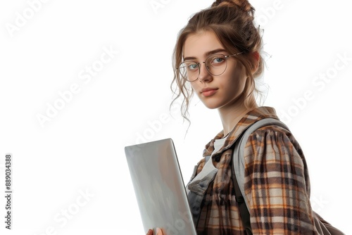 European woman holding a laptop looking techsavvy   348 woman, laptop, computer, business, businesswoman, student, internet, notebook, technology, beauty, working, person, people, smile, work, educati photo