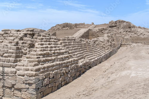 Ancient Adobe Grandeur at Pachacamac. Ancient City Echoes: Time-Worn Walls Stand Under Clear Skies.