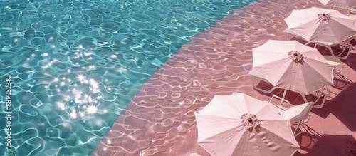 Pink Poolside Relaxation With Umbrellas and Loungers Under a Sunny Sky
