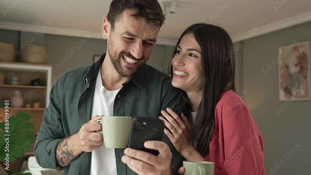 Couple use mobile phone for text message or browse internet at home Couple use mobile phone for text message or browse internet at home