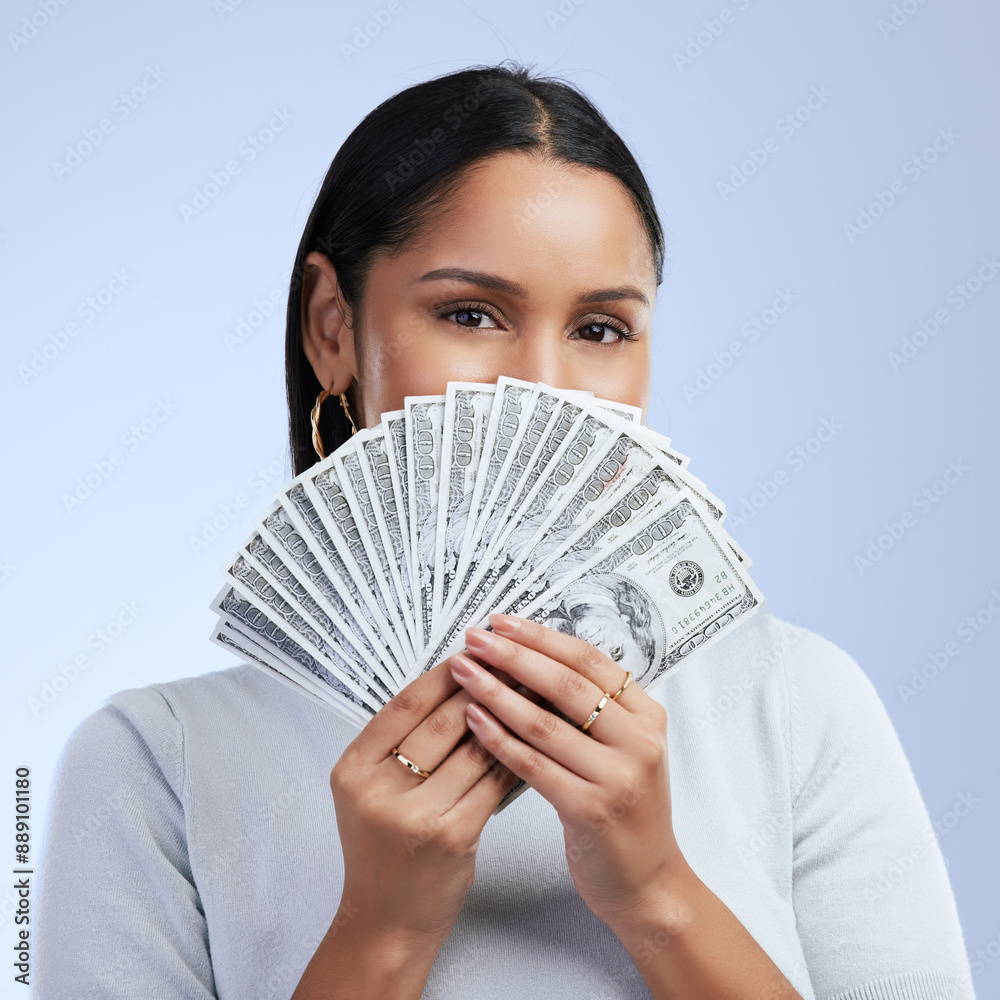 Dollars, finance and woman in portrait with money for investment bonus or stock market cashback. Financial payment, person and bills for taxes income or savings profit on blue studio background