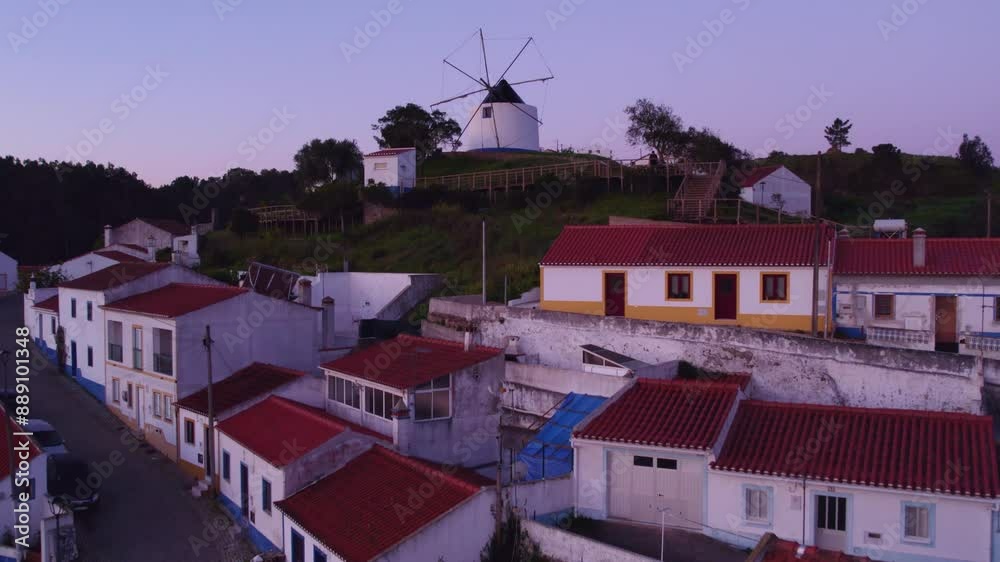Aerial view of charming windmill village at sunrise, Odeceixe, Portugal. Aerial view of charming windmill village at sunrise, Odeceixe, Portugal.
