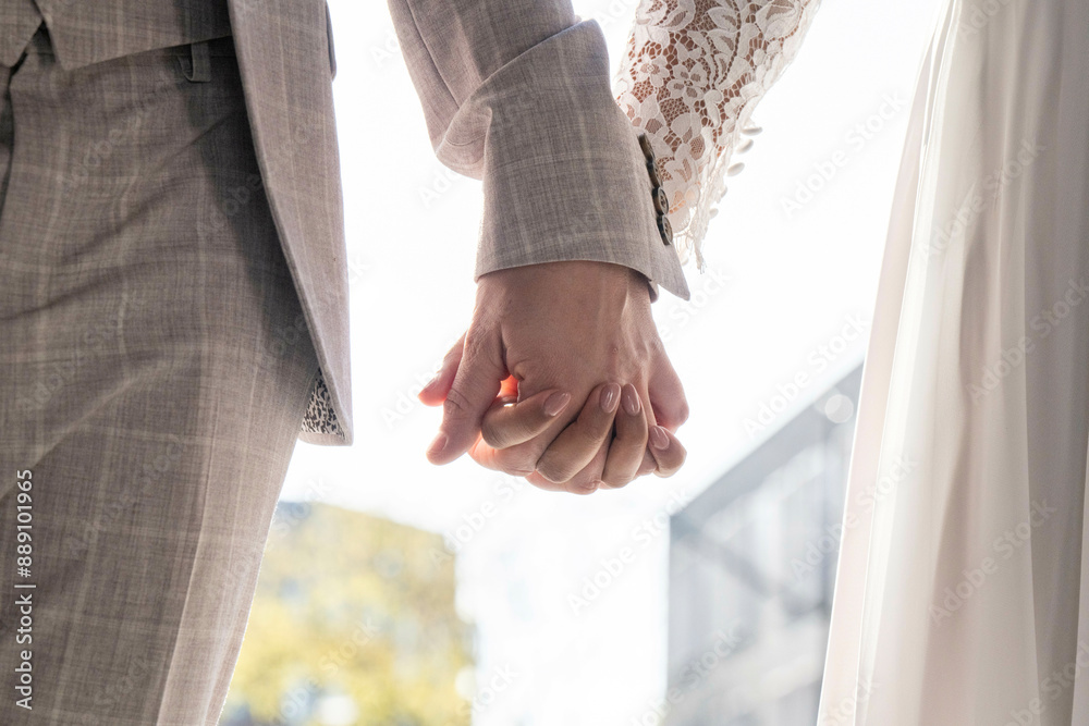 A close-up of a man and woman holding hands, symbolizing companionship with a focus on the interlocked fingers, set against a softly blurred background. A close-up of a man and woman holding hands, symbolizing companionship with a focus on the interlocked fingers, set against a softly blurred background.