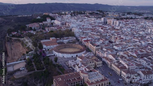 Aerial view of historic town on cliffside with famous bridge over Guadalevin River, Ronda, Spain. photo