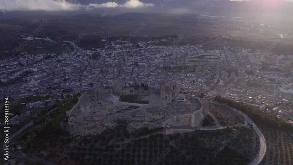 Aerial view of Fortaleza de la Mota castle and medieval town at sunrise, Alcala la Real, Jaen, Spain. Aerial view of Fortaleza de la Mota castle and medieval town at sunrise, Alcala la Real, Jaen, Spain.