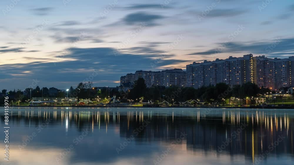 Sunset timelapse of residential area, beautiful sky with reflection in water Sunset timelapse of residential area, beautiful sky with reflection in water