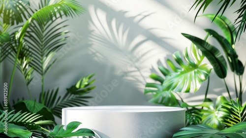 Minimalist White Pedestal Surrounded by Lush Green Tropical Plants in Sunlit Indoor Setting