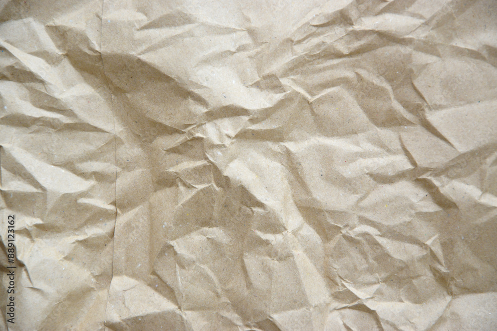 Fototapeta premium Craft crumpled paper, cardboard background. Corrugated Cardboard Texture, torn antique page, wallpaper or parchment abstract design, Horizontal rough carton